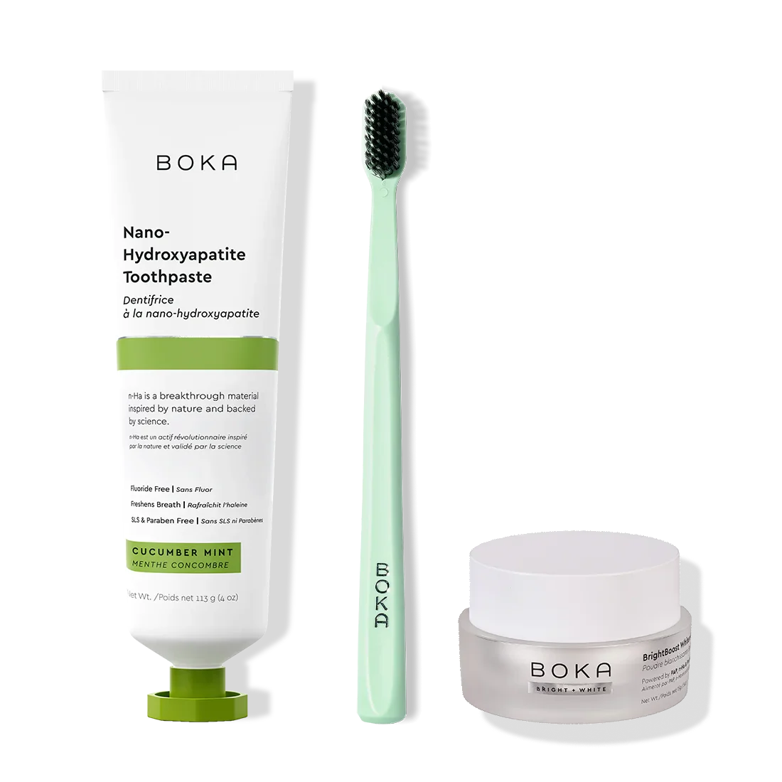 Boka toothpaste, toothbrush, and whitening powder on a white background