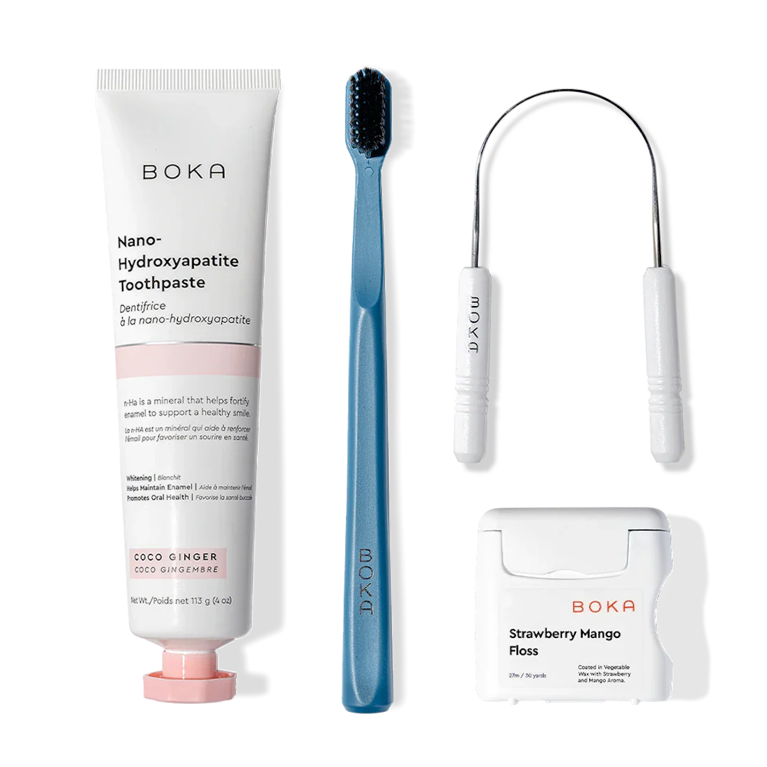 Boka Starter Kit with nano-hydroxyapatite toothpaste, charcoal toothbrush, and flosses side by side.