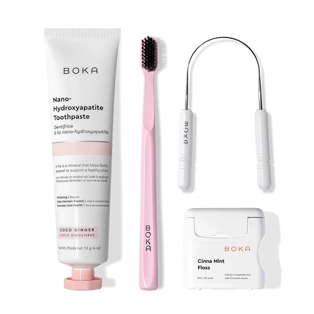 Boka Starter Kit: nano-hydroxyapatite toothpaste, charcoal bristle brush, floss, tongue cleaner.