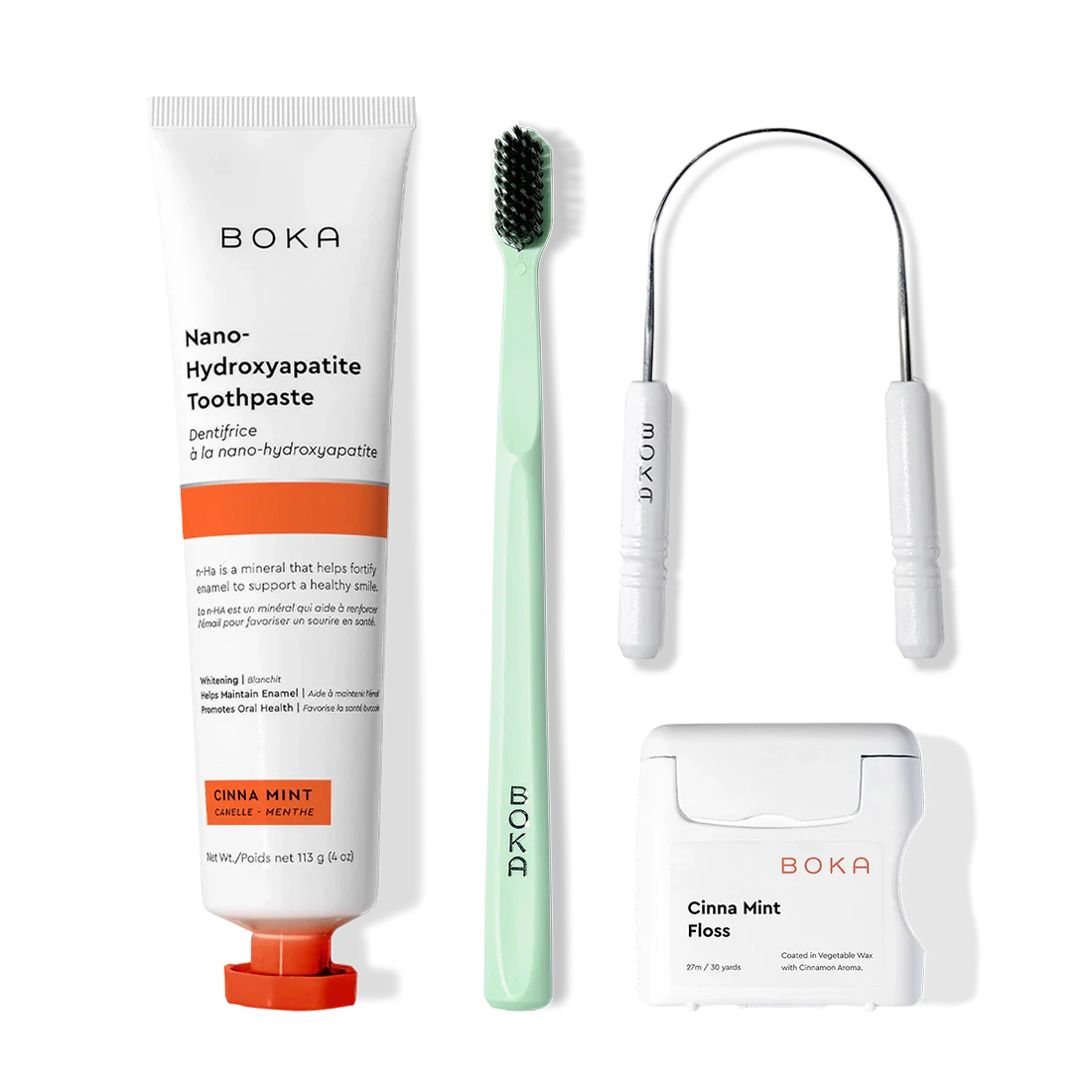 Starter Kit: toothpaste, green toothbrush, tongue cleaner & Cinna Mint floss on a white background.