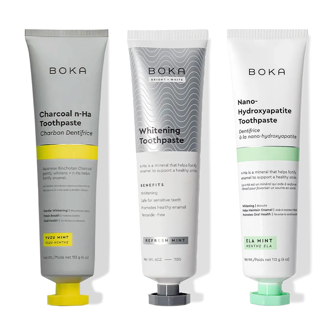 Three upright tubes of Charcoal Yuzu Mint Whitening n-Ha Toothpaste 3-pack on a white background.