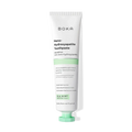 A tube of Ela Mint n-Ha Toothpaste stands upright on a white background.