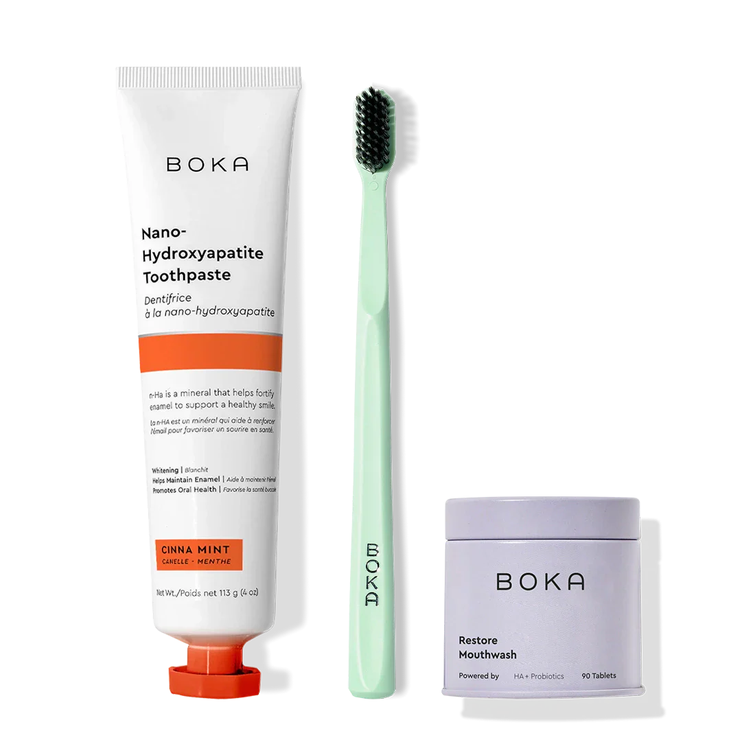 Fresh Faced toothpaste, green charcoal toothbrush, and Restore Mouthwash tablets displayed.