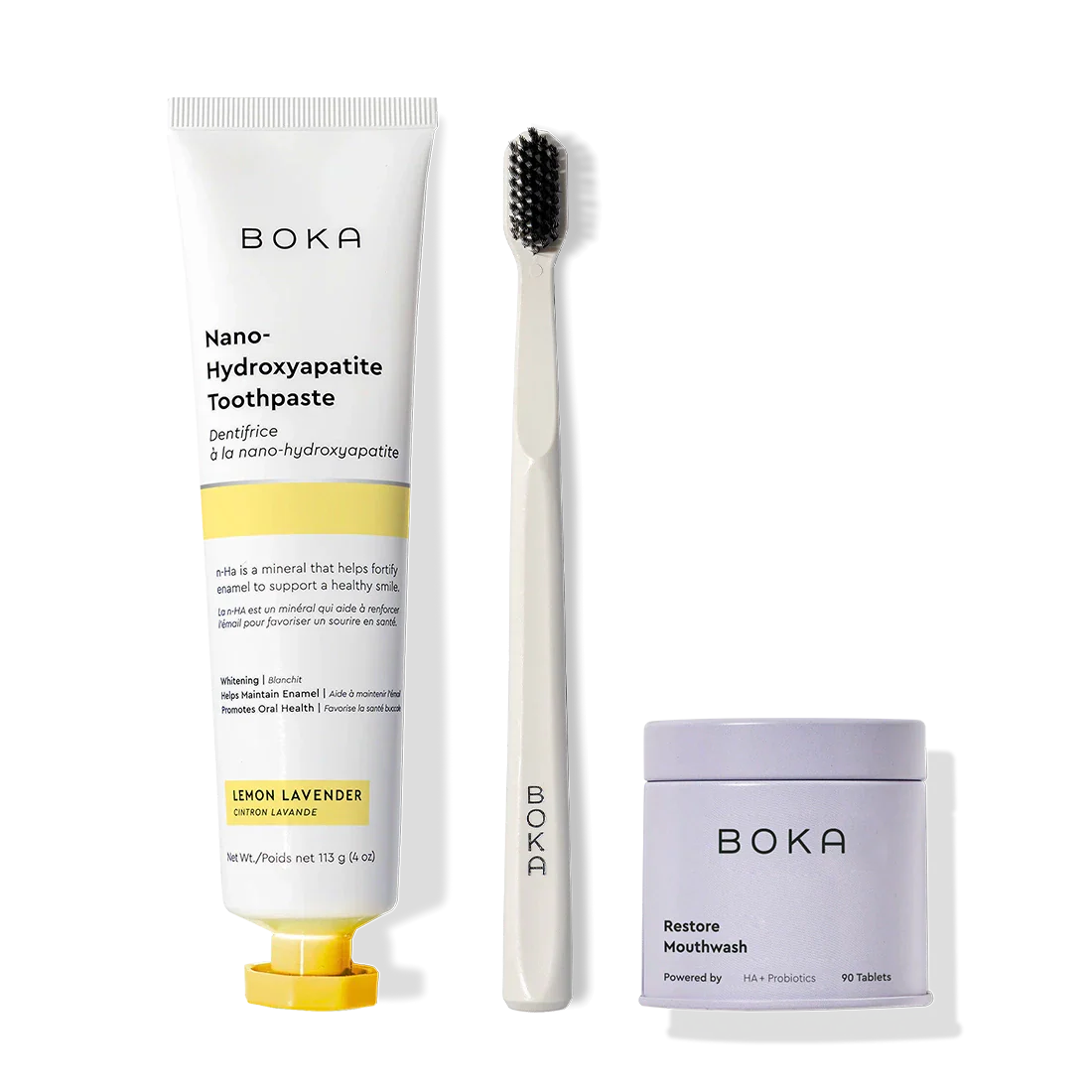 Fresh Faced toothpaste, black toothbrush with charcoal bristles, and Restore Mouthwash tablets.