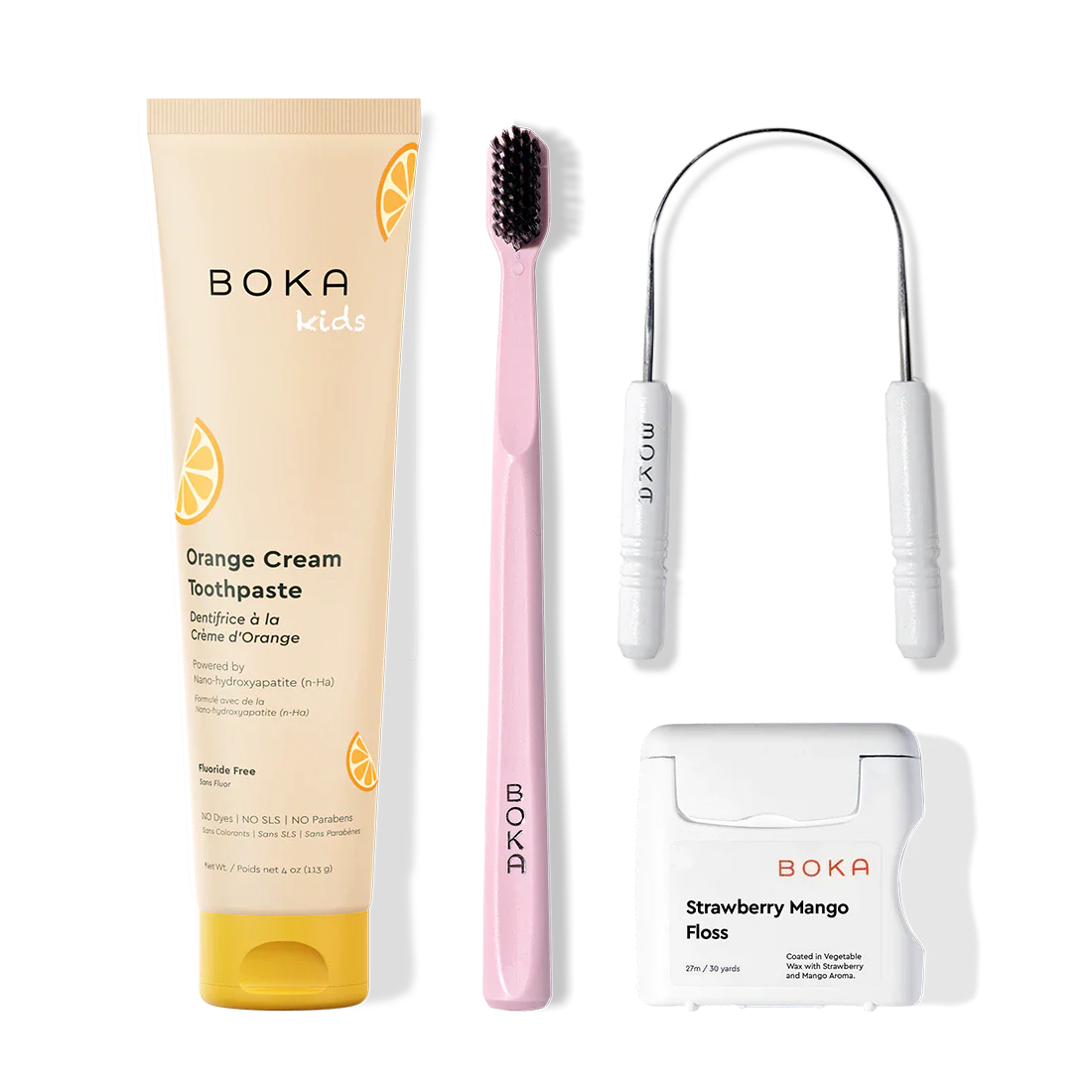 Boka dental care products including toothpaste, toothbrush, Tongue Scraper and floss on a white background