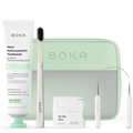 Boka dental care product set including toothpaste, toothbrush, floss, and case on a white background