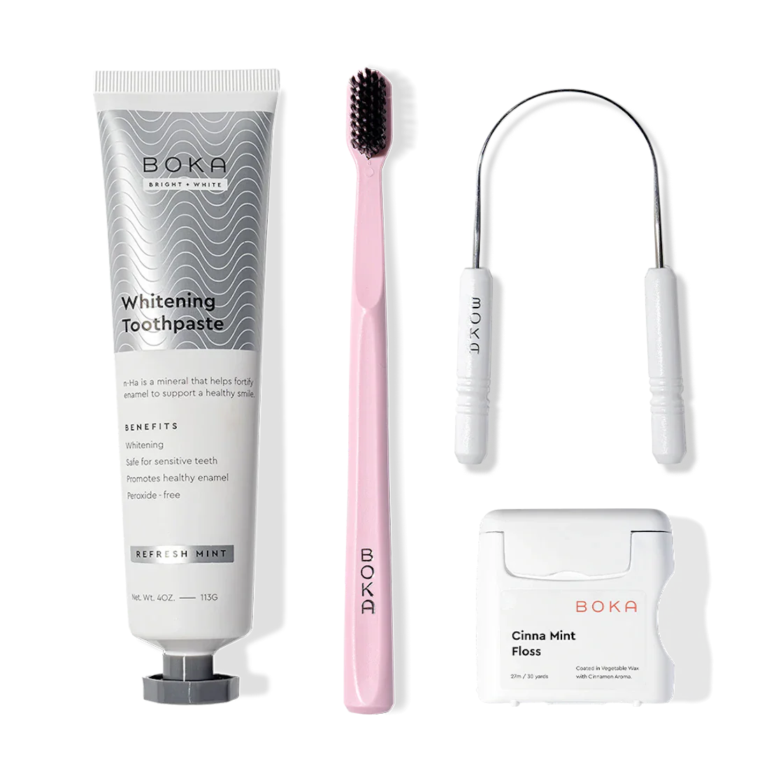 The Starter Kit includes toothpaste, a pink toothbrush, floss, and a pick for a neat oral care display.