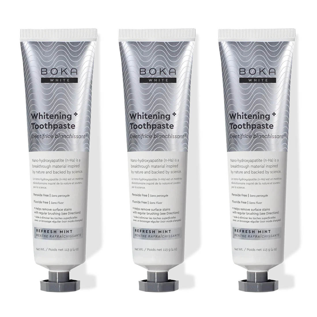 Three tubes of Boka Whitening Toothpaste on a white background