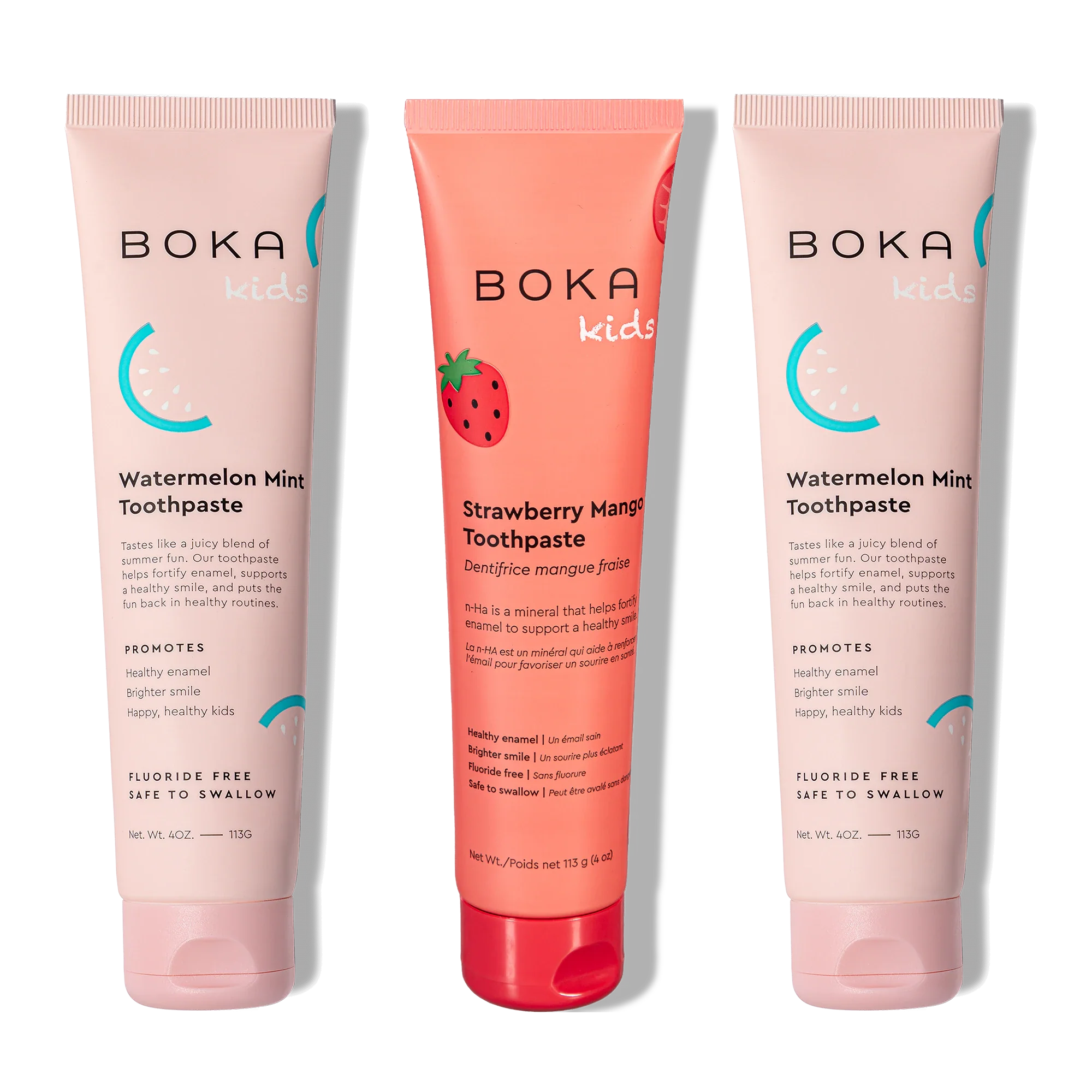 Three Boka toothpaste tubes in watermelon mint and strawberry mango flavors on a white background